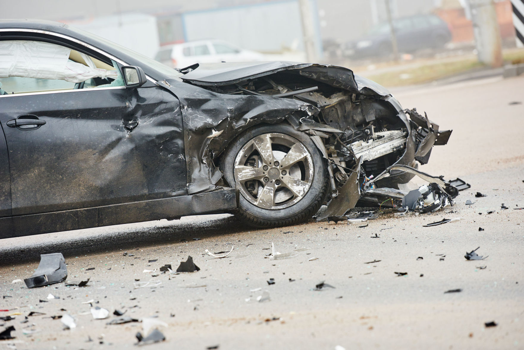 car crash accident on street, damaged automobile after collision in city